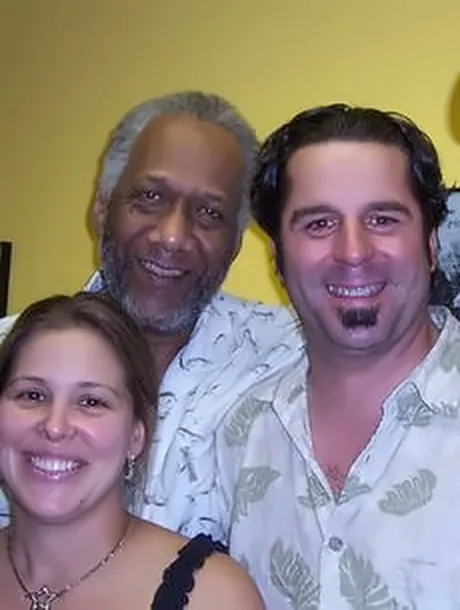 Chuck Rainey with Paul and Jessica Rogalski, smiling for a photo